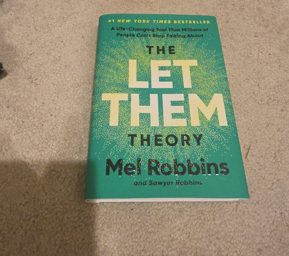 The Let Them Theory Hardcover Book in Green by Mel Robbins